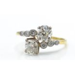 d diamond cross over ring. The ring being set with 2 old cut diamonds 1.5ct total