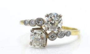 d diamond cross over ring. The ring being set with 2 old cut diamonds 1.5ct total