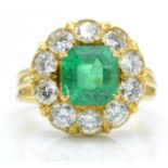 An 18ct Gold Emerald & Diamond Cluster Ring