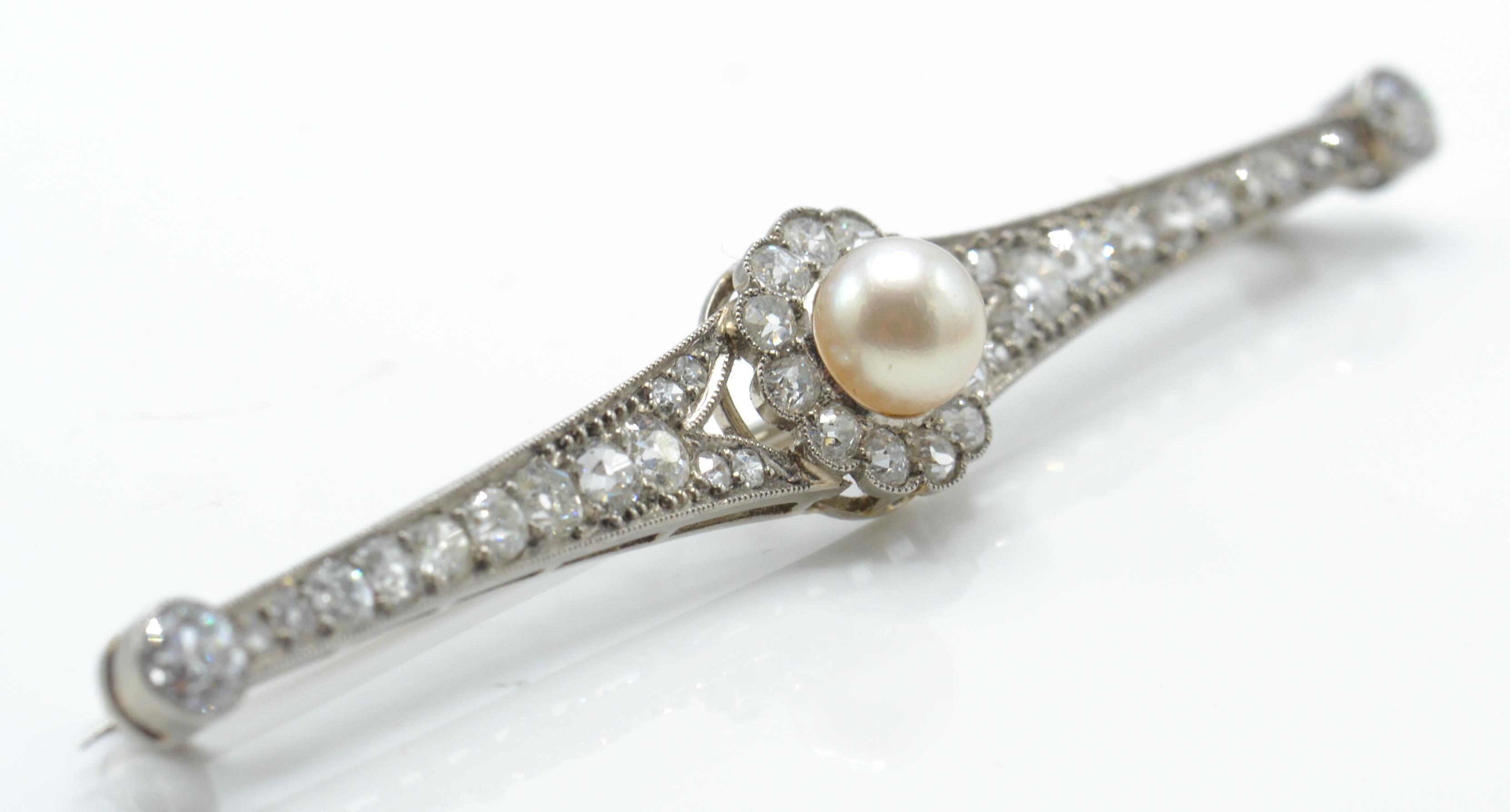 A 14ct white gold pearl and diamond bar brooch pin. The brooch set with a central pearl - Image 2 of 6