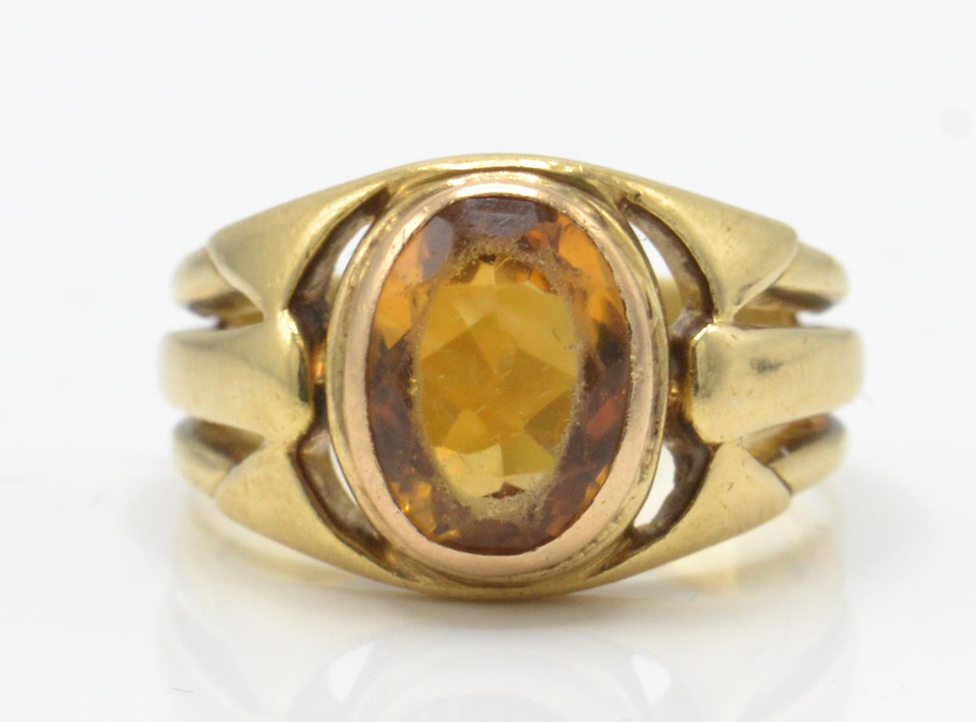 A French Art Nouveau 18ct gold and citrine ring