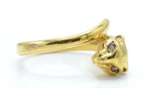 An 18ct gold and diamond figural ring. The ring in the form of a panther