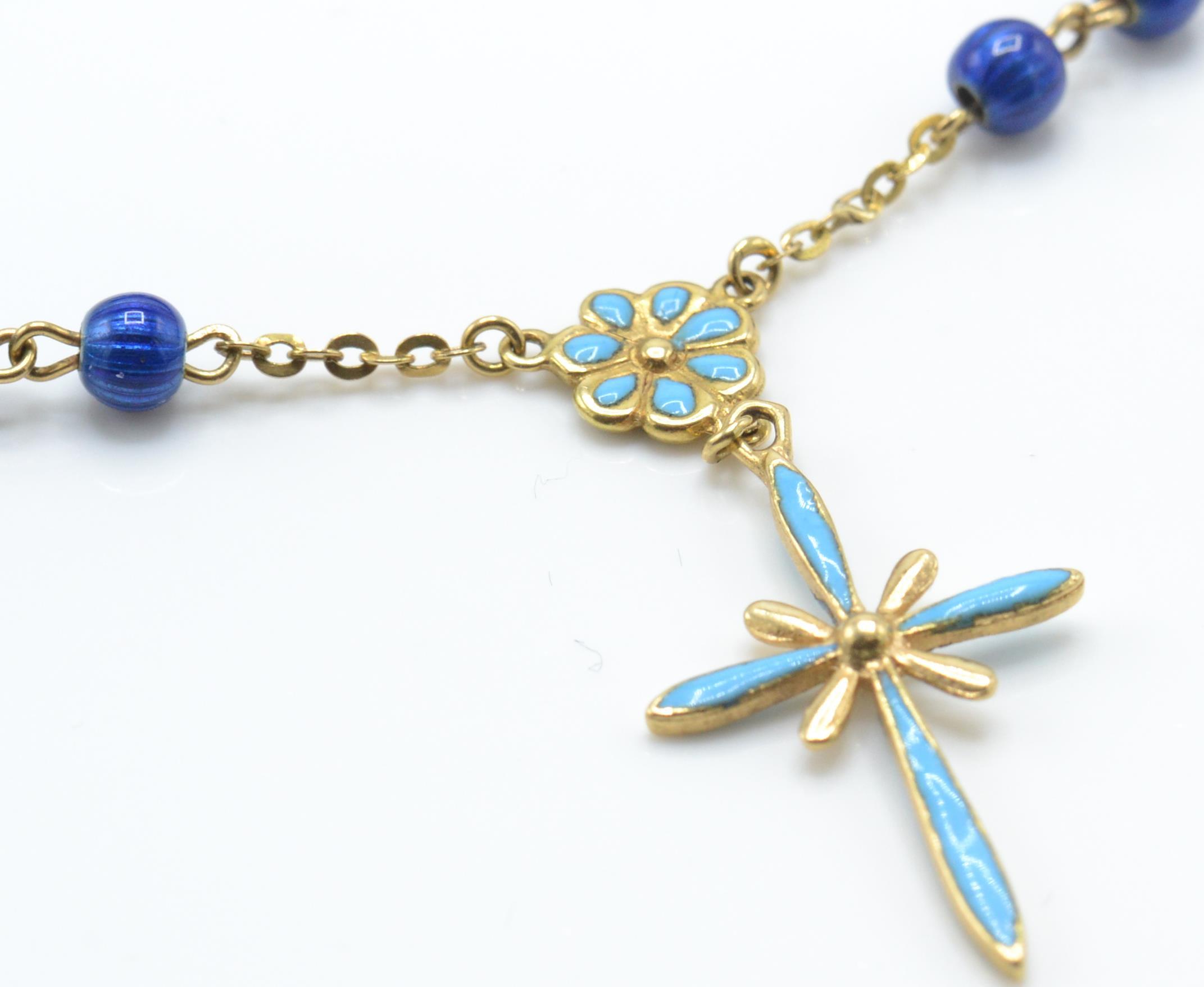 An Italian 18ct gold pearl and enamel cruciform pendant bracelet.