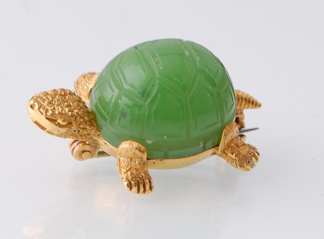 An 18ct gold French novelty brooch. The brooch in the form of a turtle