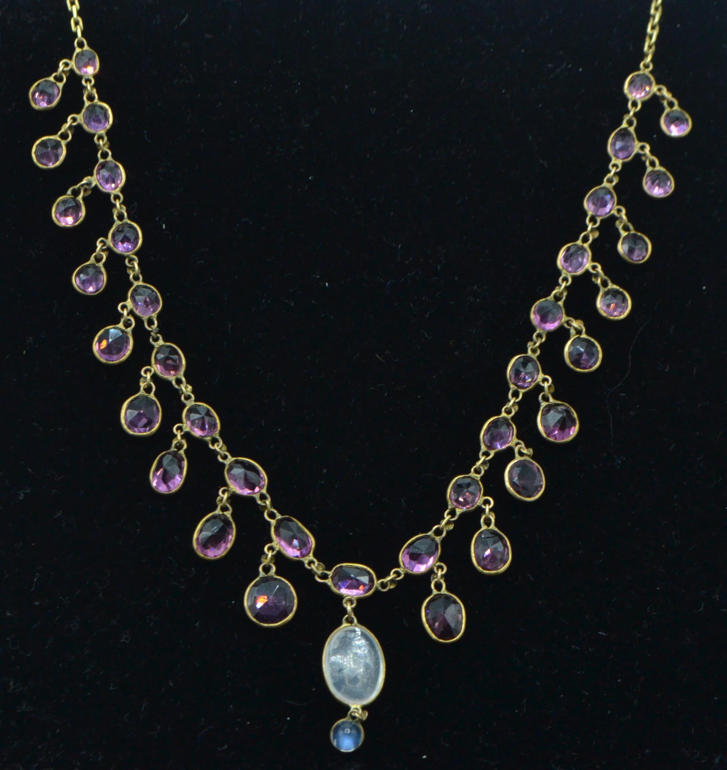 A late 19th Century gold necklace set with faceted