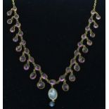 A late 19th Century gold necklace set with faceted