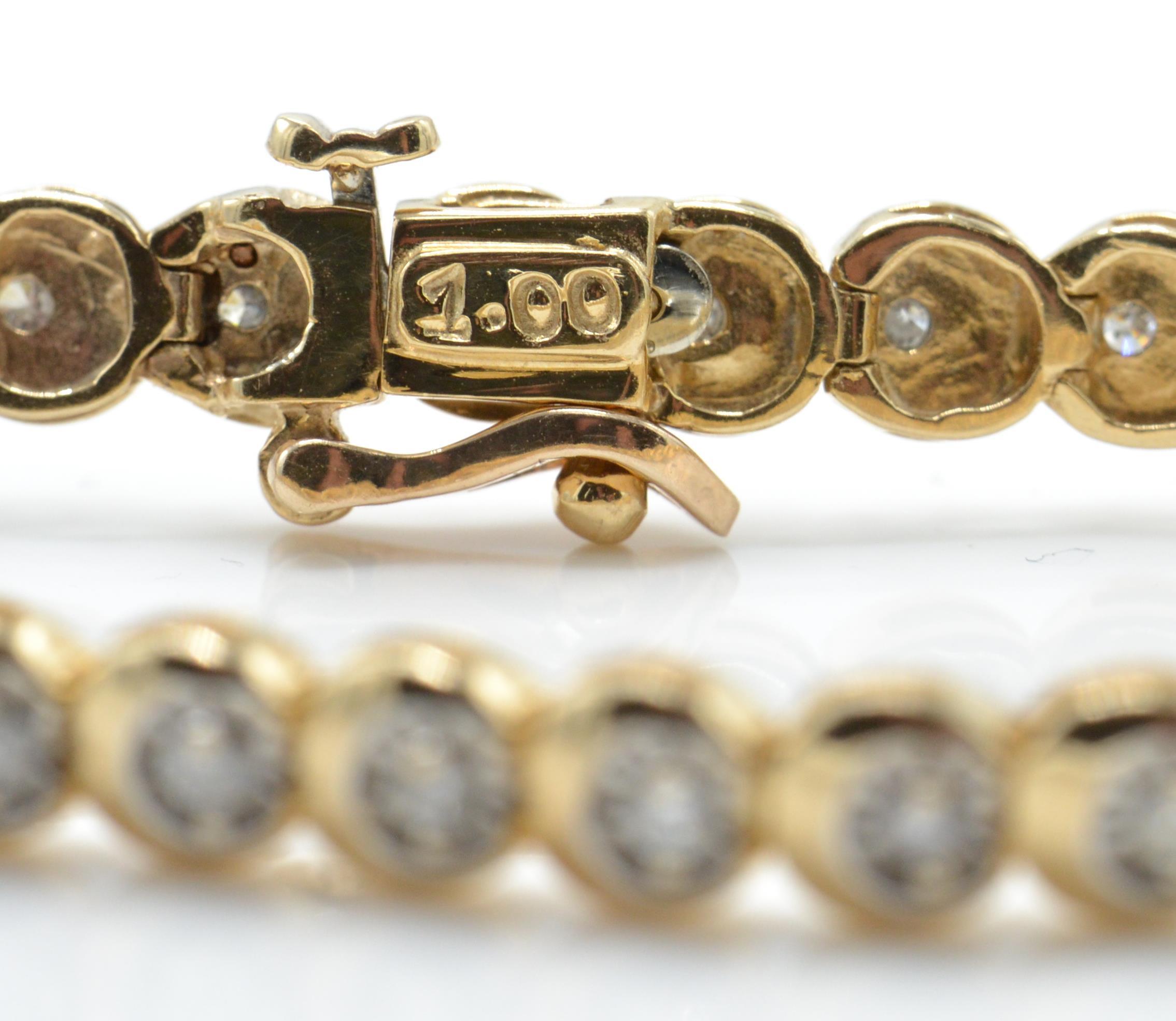A hallmarked 9ct gold and diamond tennis bracelet with 40 brilliant cut diamonds - Image 3 of 5