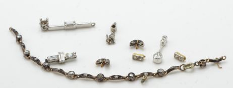 A collection of diamond findings to include mixed cut, baguette, old cut, pear