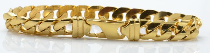 A London hallmarked 9ct gold flat curb belcher linked bracelet