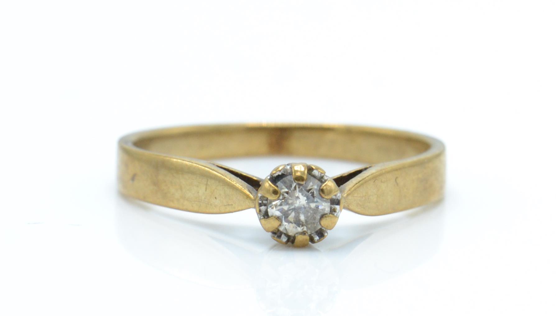 A hallmarked 9ct gold and diamond solitaire ring