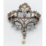 An Art Nouveau Ginko leaf motif's gold, pearl and diamond brooch pin.