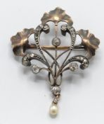 An Art Nouveau Ginko leaf motif's gold, pearl and diamond brooch pin.