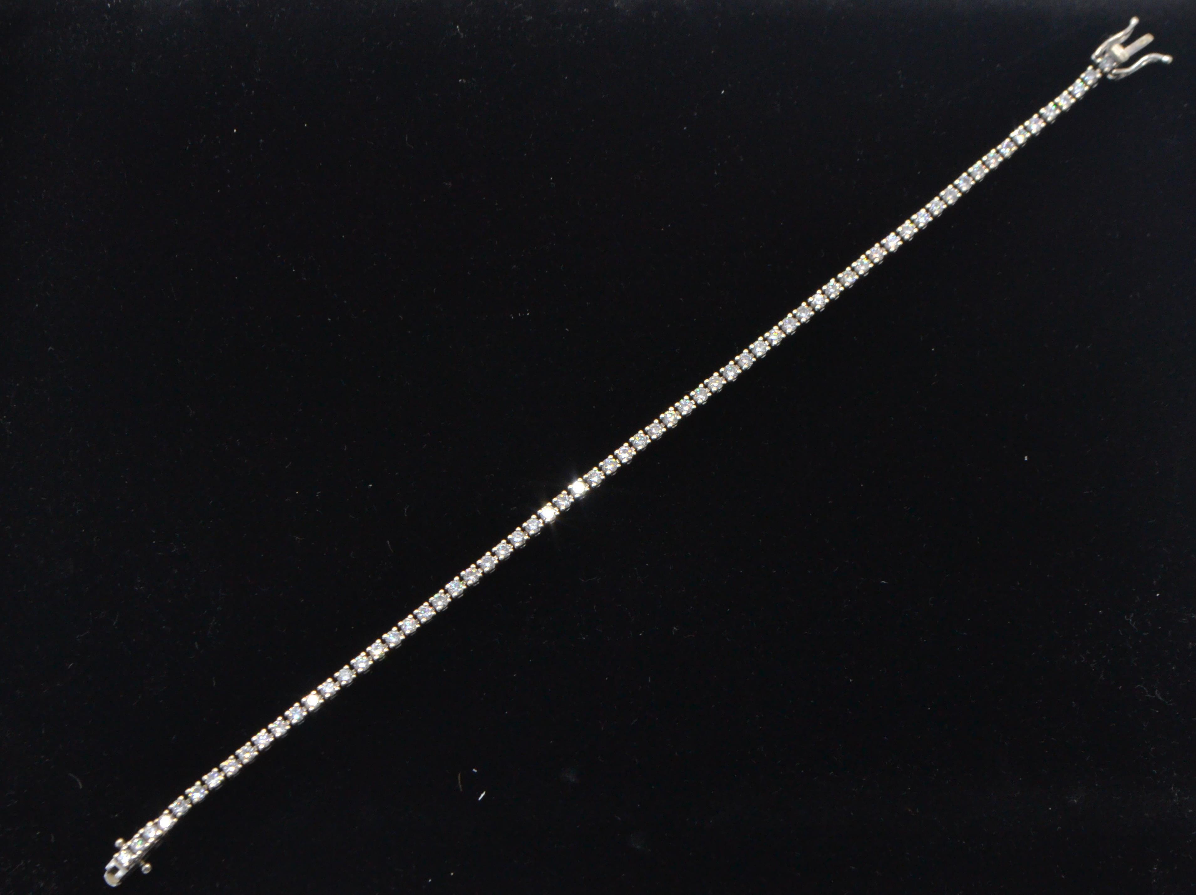 An 18ct white gold tennis bracelet set with round - Image 2 of 8