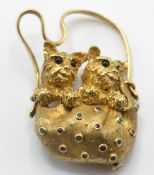 A French 18ct gold emerald and ruby figural brooch. The brooch in the form of 2 terrier dogs