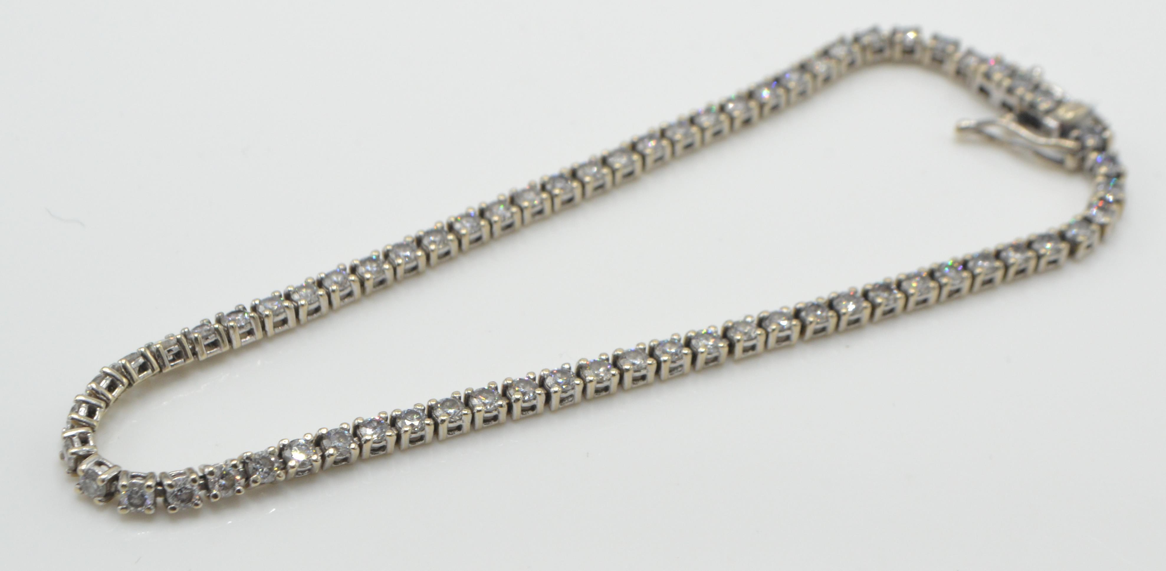 An 18ct white gold tennis bracelet set with round - Image 3 of 8