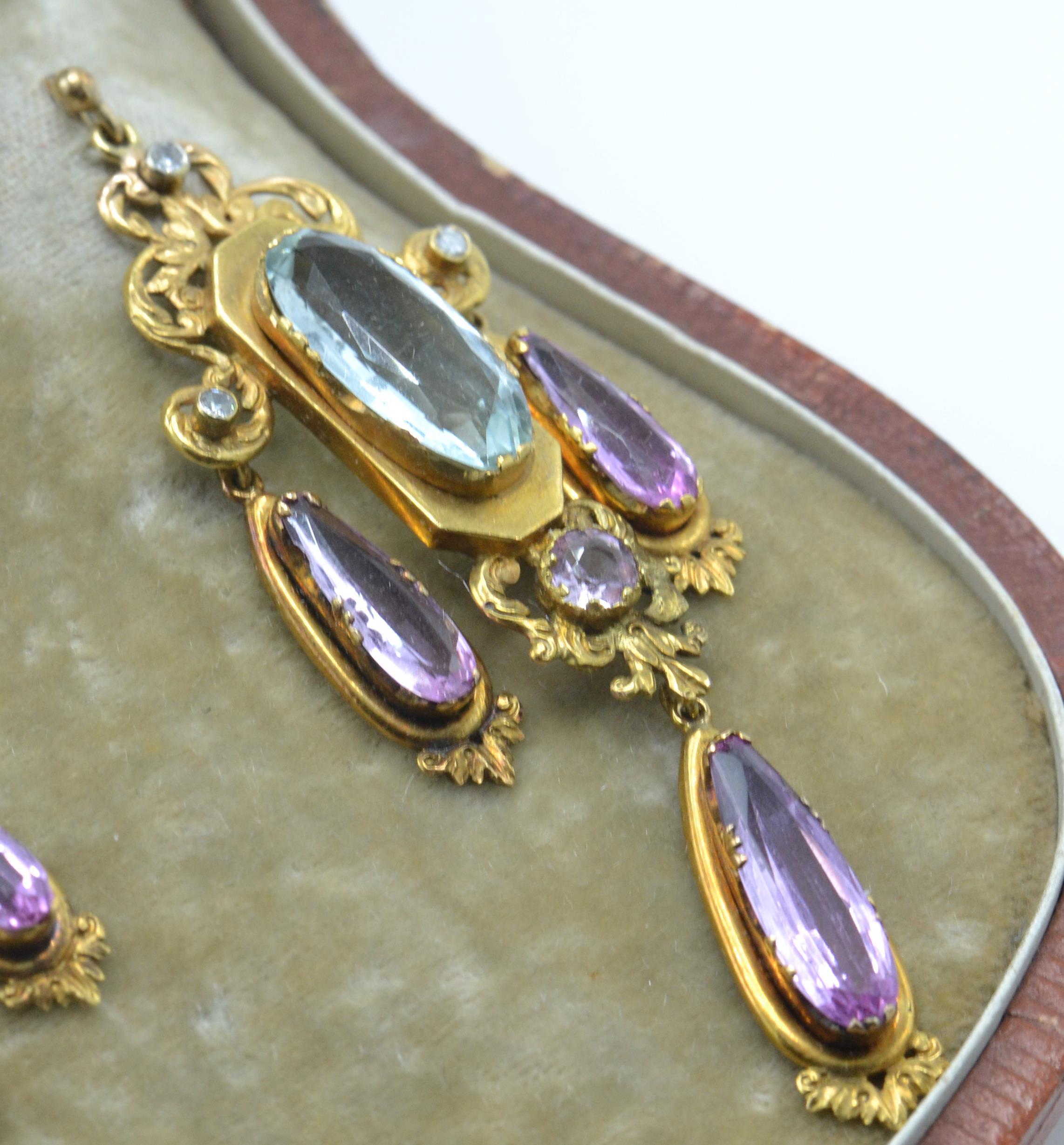 A cased 19th century gold, aquamarine, pink topaz and diamond brooch and earring suite. - Image 5 of 9