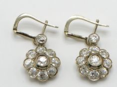 A pair of 18ct gold early 20th century diamond cluster drop earrings