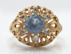 A hallmarked 9ct gold and blue stone ring
