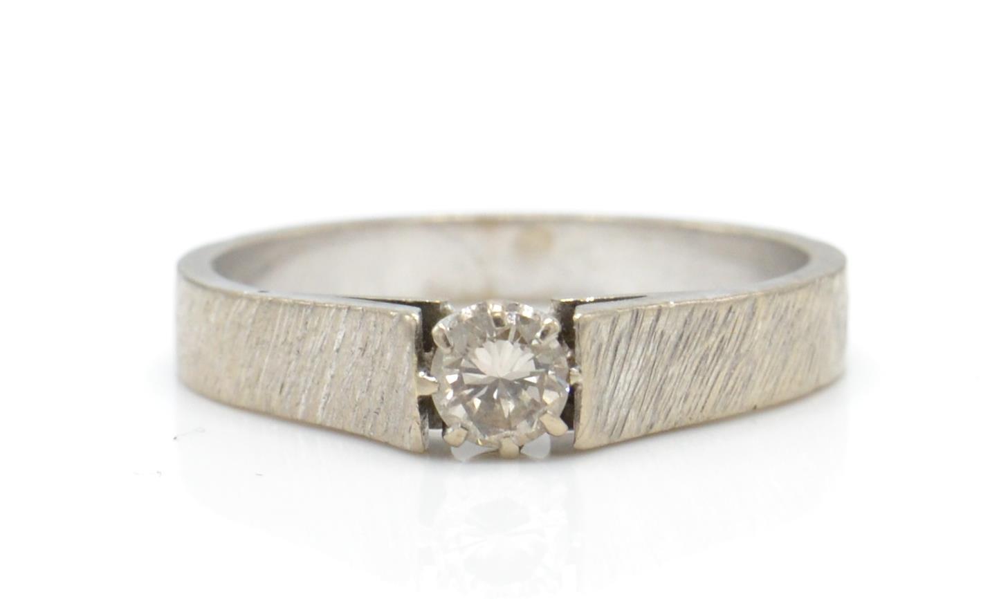 An 18ct white gold and diamond solitaire ring