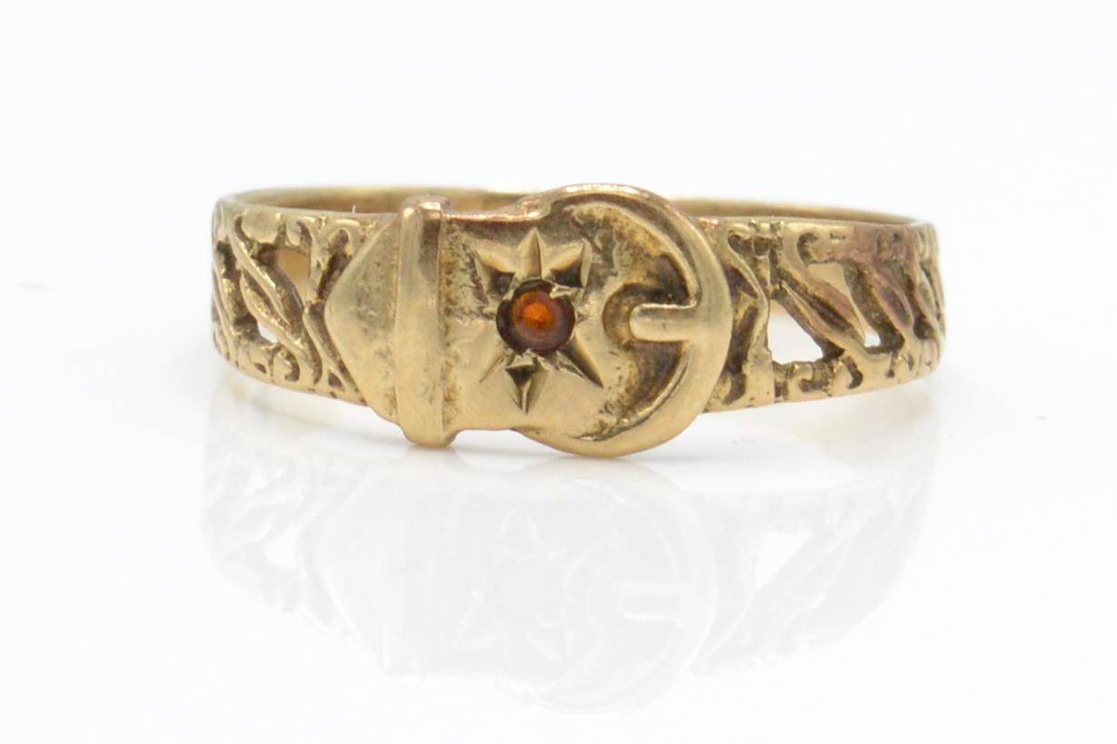 A hallmarked 9ct gold buckle ring