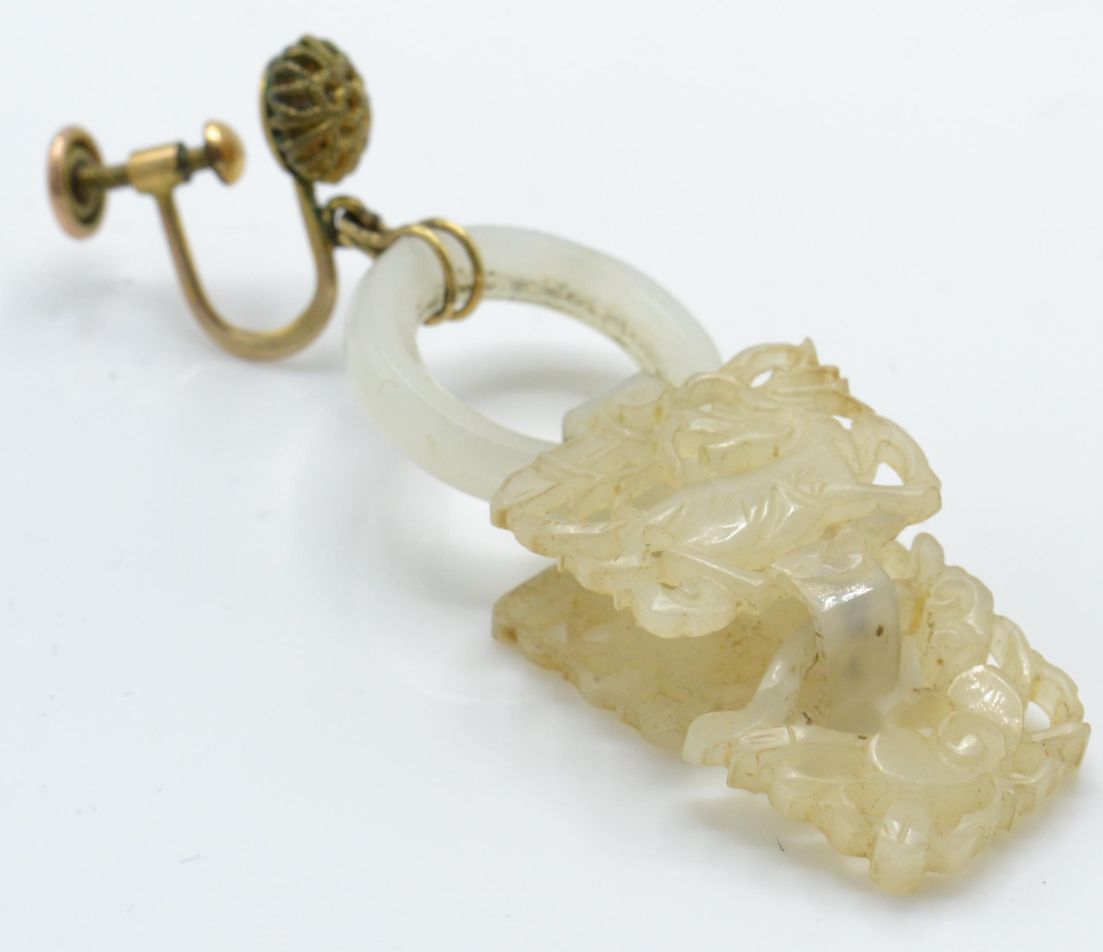 A pair of 19th century Chinese carved jade Qilin and Crab drop earrings. - Image 2 of 5