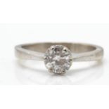 A hallmarked 18ct white gold and diamond solitaire ring. The ring set with a round brilliant cut dia