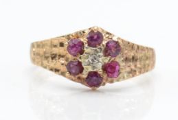 A 1970's hallmarked 9ct gold ruby and diamond ring