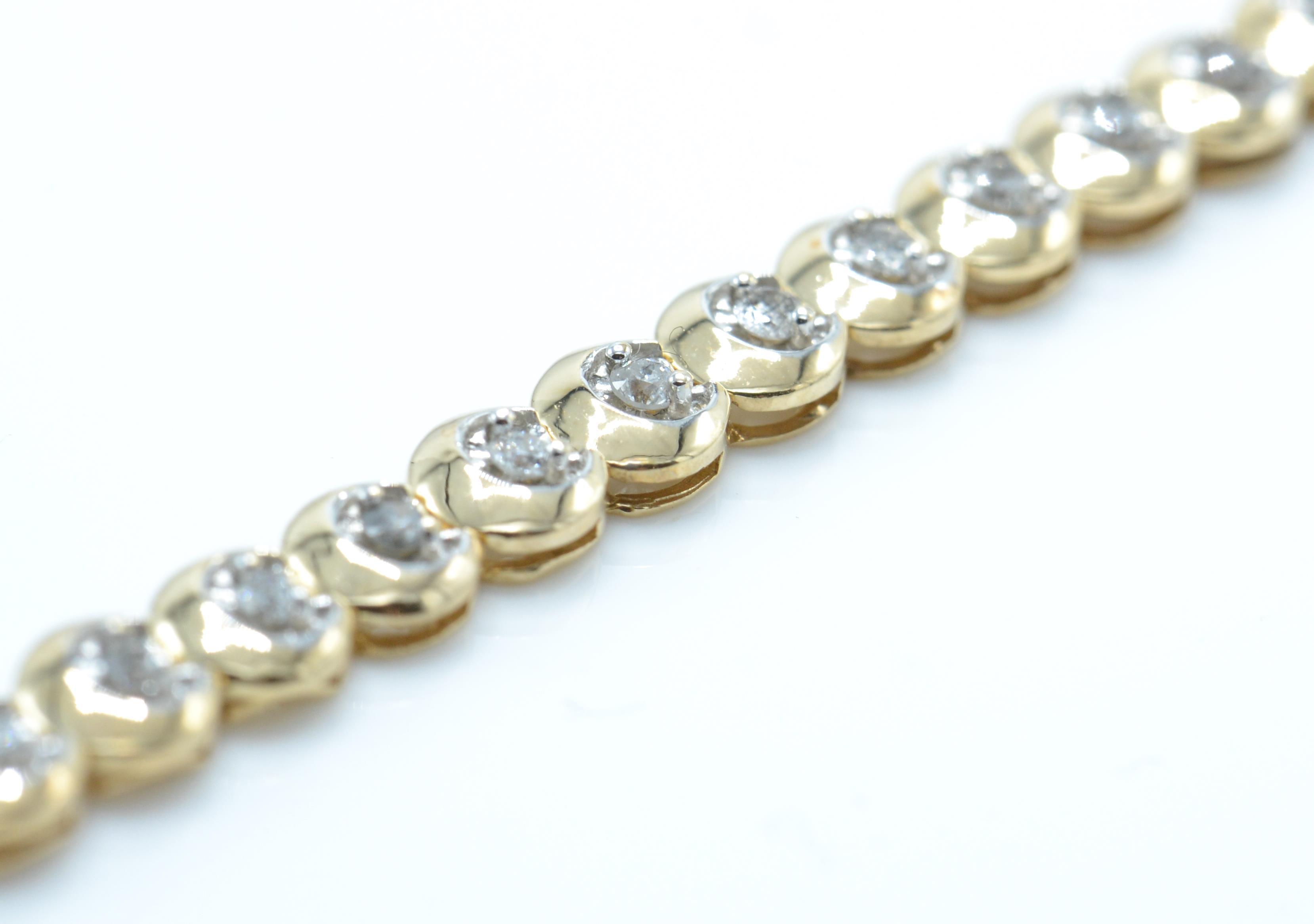 A hallmarked 9ct gold and diamond tennis bracelet with 40 brilliant cut diamonds - Image 4 of 5