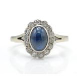 A 14ct Gold sapphire & Diamond Cluster Ring