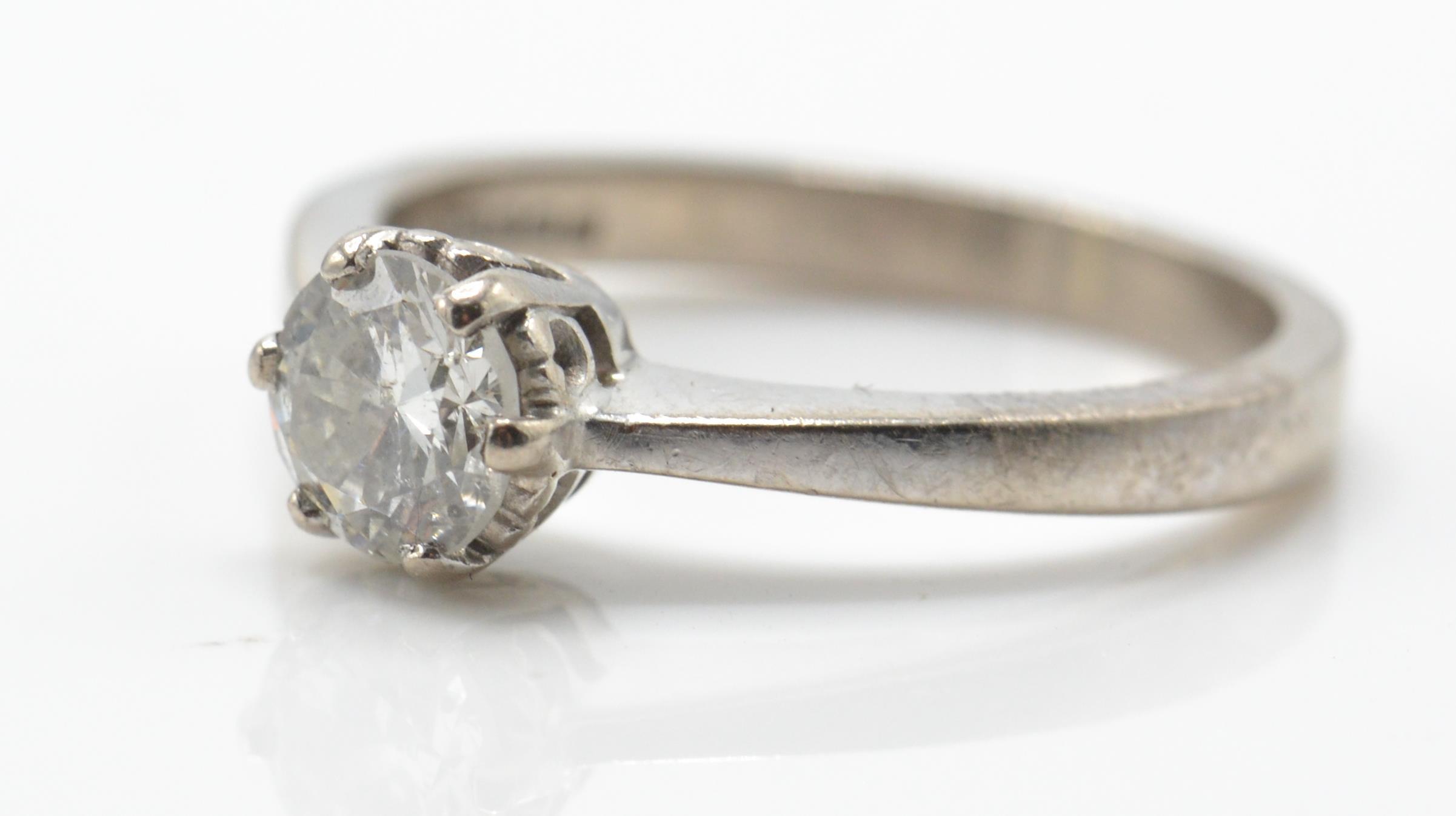 A hallmarked 18ct white gold and diamond solitaire ring. The ring set with a round brilliant cut dia - Image 3 of 4