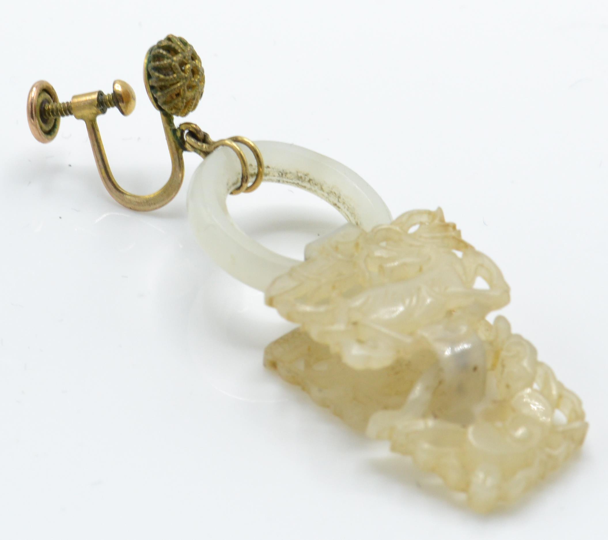 A pair of 19th century Chinese carved jade Qilin and Crab drop earrings. - Image 3 of 5