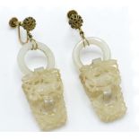 A pair of 19th century Chinese carved jade Qilin and Crab drop earrings.