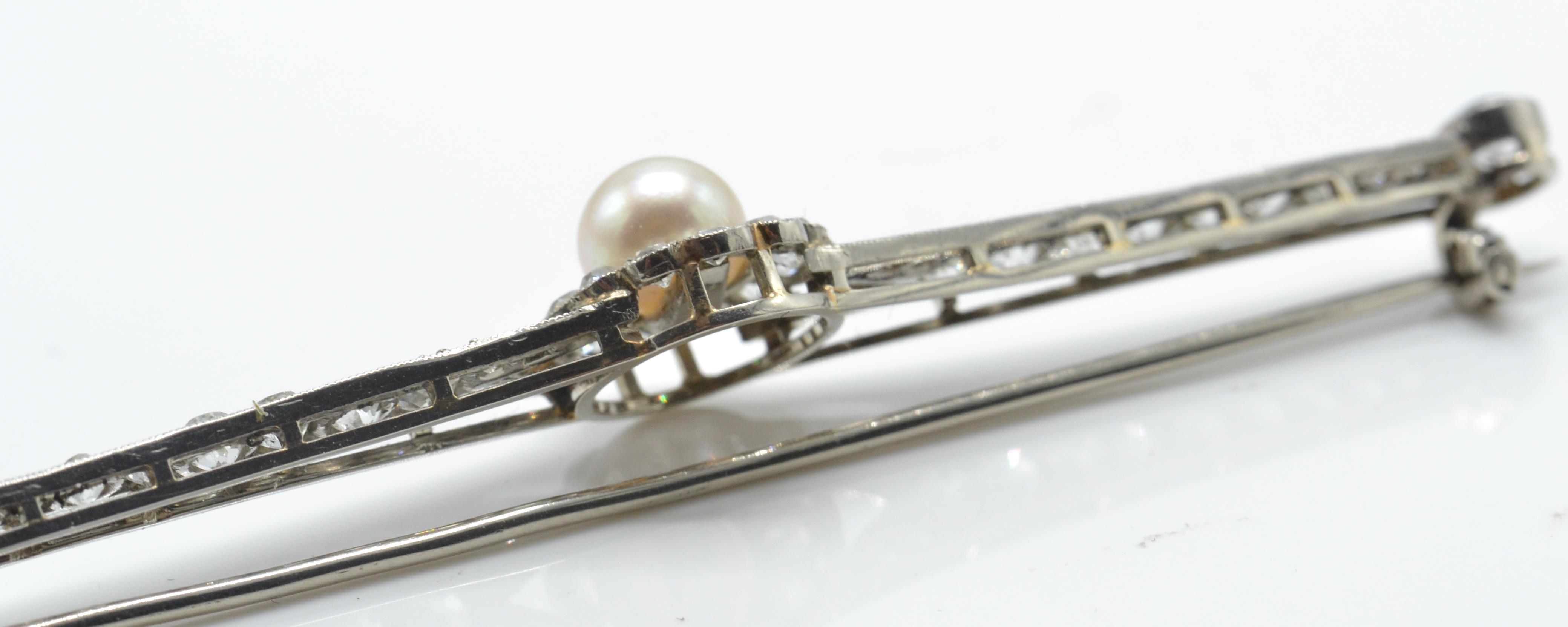 A 14ct white gold pearl and diamond bar brooch pin. The brooch set with a central pearl - Image 4 of 6