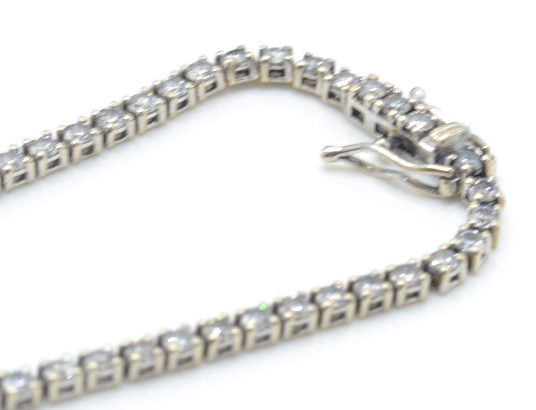 An 18ct white gold tennis bracelet set with round - Image 4 of 8