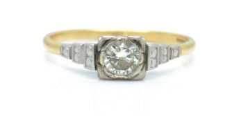 An Art Deco 18ct gold and diamond solitaire ring.