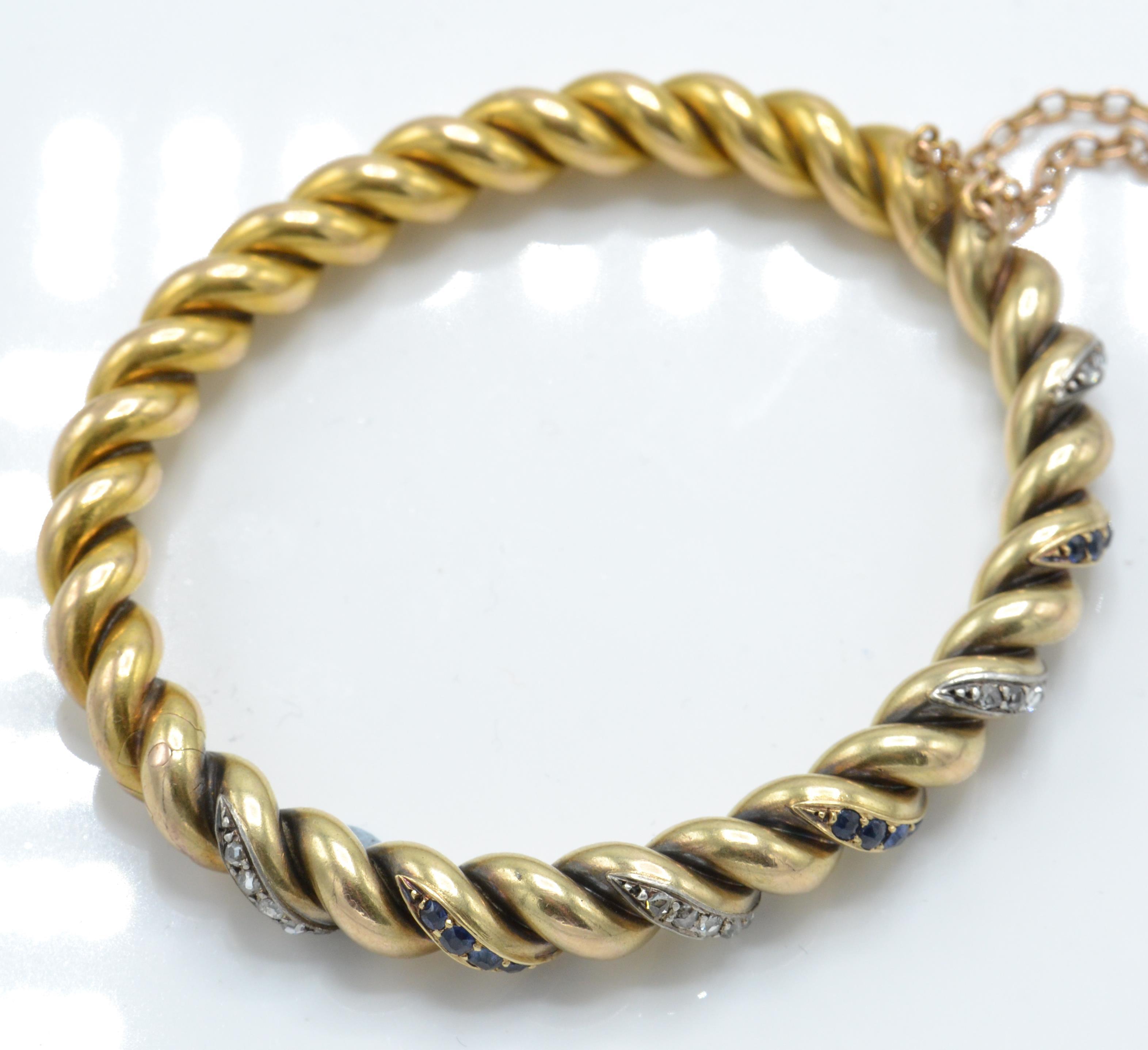 A French 18ct gold sapphire and diamond bangle / bracelet. - Image 2 of 5