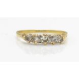 A hallmarked 18ct gold 5 stone diamond ring