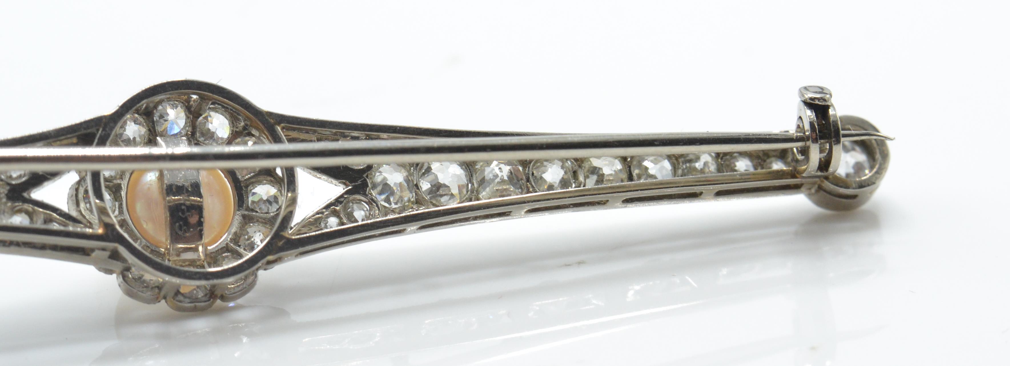 A 14ct white gold pearl and diamond bar brooch pin. The brooch set with a central pearl - Image 5 of 6