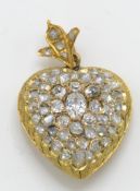 An antique Glad and diamond heart pendant. The pendant in the form of a heart encrusted with rose