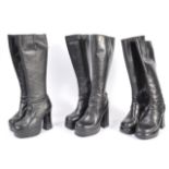 UNIFORM AND FASNCY DRESS - A GROUP OF THREE VINTAGE RETRO BLACK LEATHER GOGO BOOTS.