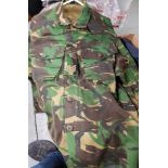 UNIFORMS & FANCY DRESS - A COLLECTION OF CAMOUFLAGE COMBAT JACKETS AND A HAT.