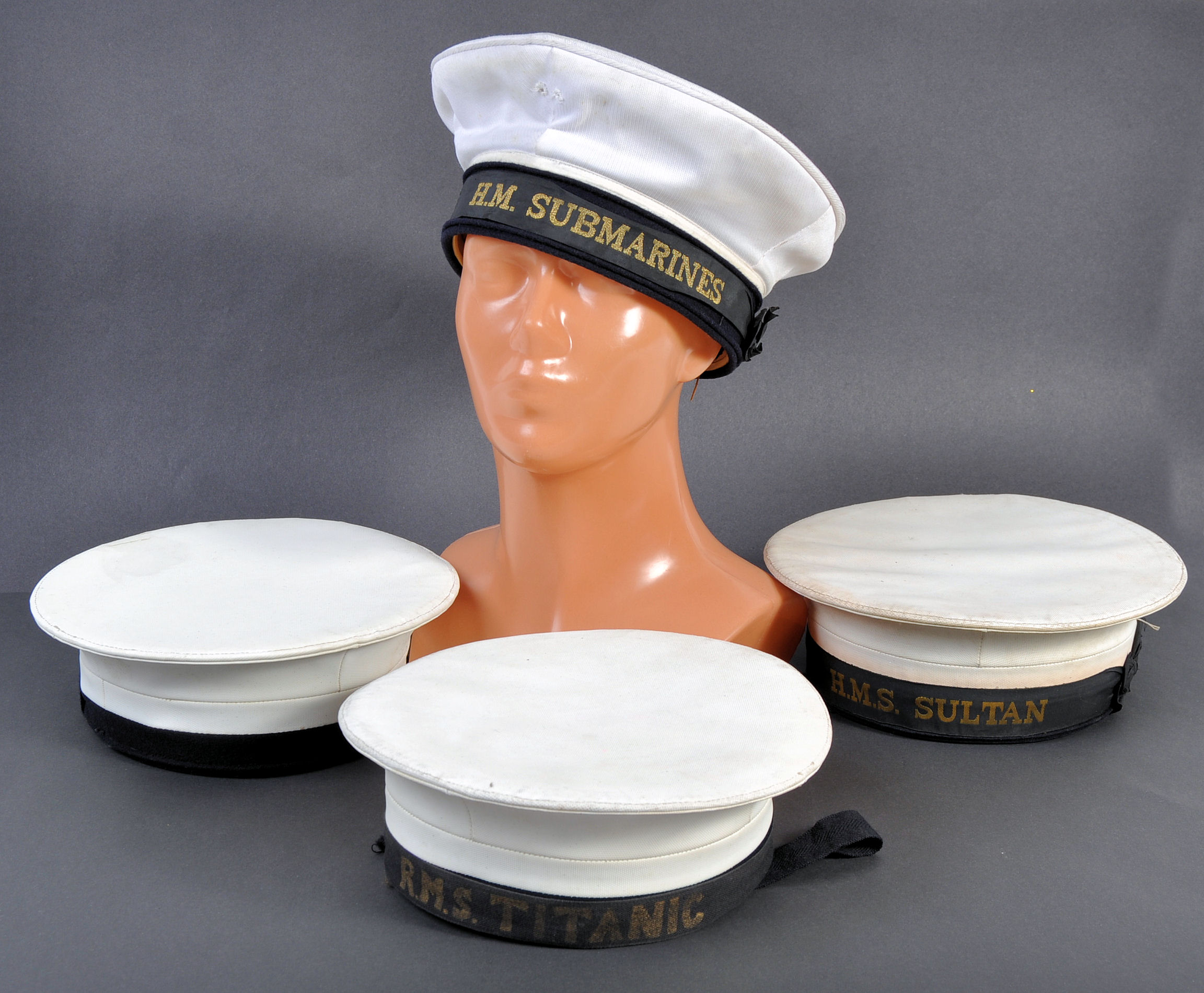 UNIFORMS AND FANCY DRESS - A GROUP OF FOUR NAVY MARINE SAILOR BERETS.