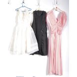 UNIFORMS AND FANCY DRESS - A COLLECTION OF THREE ASSORTED LADIES VINTAGE RETRO DRESSES.