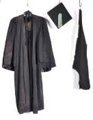 UNIFORMS AND FANCY DRESS - A BLACK UNIVERSITY GRADUATION COSTUME GOWN.