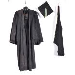 UNIFORMS AND FANCY DRESS - A BLACK UNIVERSITY GRADUATION COSTUME GOWN.