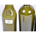 COLLECTION OF FOUR ANTIQUE GLASS WINE BOTTLES