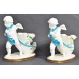 PAIR OF MINTON THOMAS GOODE PORCELAIN CHERUB CORNUCOPIA VASES