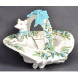 19TH CENTURY PORCELAIN BASKET WITH DOG FIGURINE