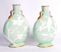 PAIR OF 19TH CENTURY MINTON PORCELAIN MOON FLASKS