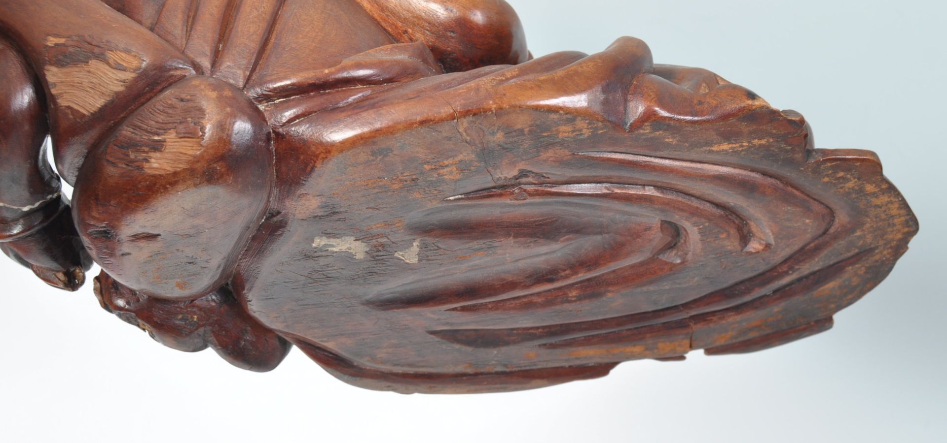 A PAIR OF CHINESE CARVED WOOD FIGURES OF RECLINING - Image 5 of 5